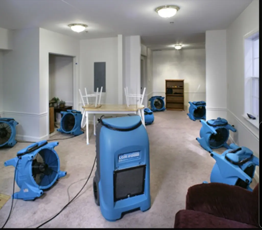 Air movers and dehumidifier setup for Water Damage Restoration in Ventnor City